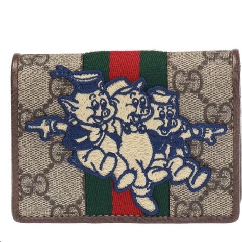 gucci year of the pig wallet|gucci three little pigs logo.